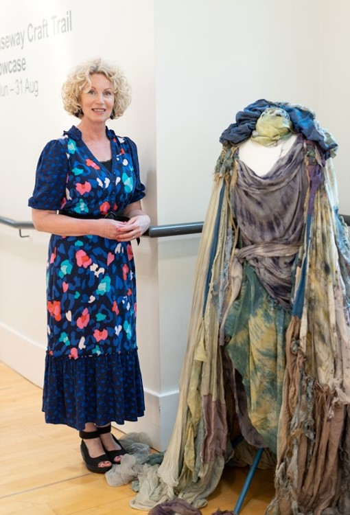 Angela Turkington of Leopard and Lily is pictured with her Selkie Cloak which was created as part of the Northword Storytagging Project.