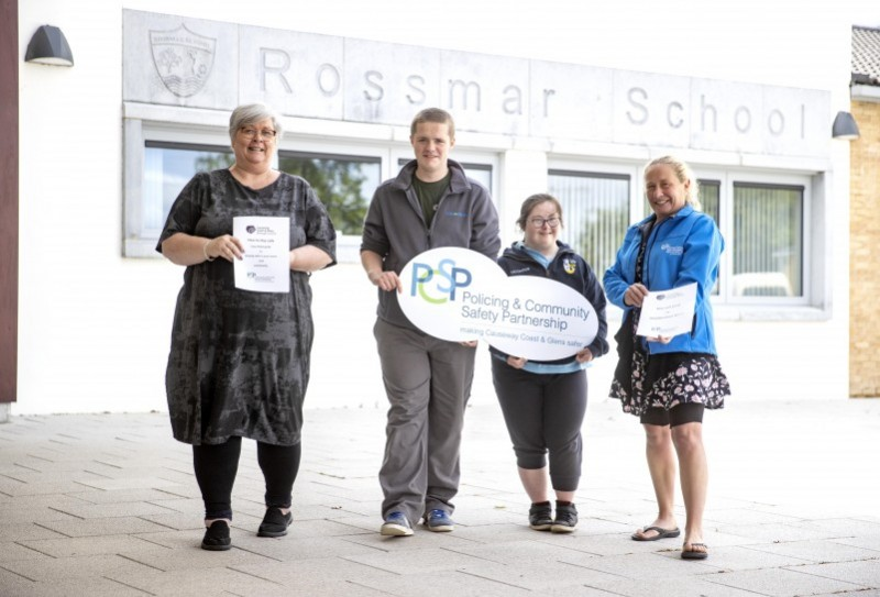 Pupils at Rossmar School in Limavady were recently presented with a new Easy Read guide to community safety. Pictured are Vice Principal, Ms C Archibald (left); pupils Zoe and Aiden and Melissa Lemon, PCSP Officer.