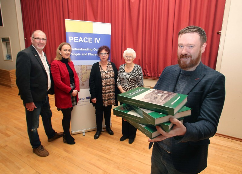 Representatives from Carey Historical Society, Kevin McGowan and Aidan McMichael, with Councillor Cara McShane, Causeway Coast and Glens Borough Council’s Museum Services Development Manager Helen Perry and Vice Chair Peace IV Partnership Patricia Crossley pictured at the recent launch of the new book, ‘Placenames and Fieldnames of Culfeightrin’.