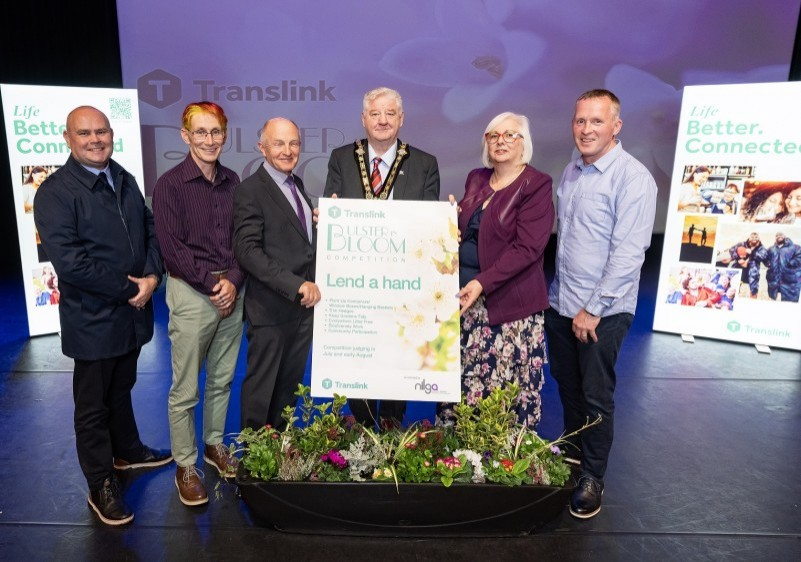 Mayor of Causeway Coast and Glens, Councillor Steven Callaghan pictured alongside Council’s Estates Team including Rodney Boyd and Gareth McGee, as they collect awards for Coleraine and Ballymoney at the recent Ulster in Bloom awards. (image credits Translink)