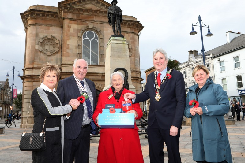 The Mayor of Causeway Coast and Glens Borough Council, Councillor Richard Holmes and Council’s Veterans’ Champion, Alderman Sharon McKillop pictured with William Oliver, Deputy Lieutenant of Londonderry, Margaret Oliver and Poppy Appeal fundraiser Breeze Galbraith at the launch of the 2021 Poppy Appeal at Coleraine War Memorial