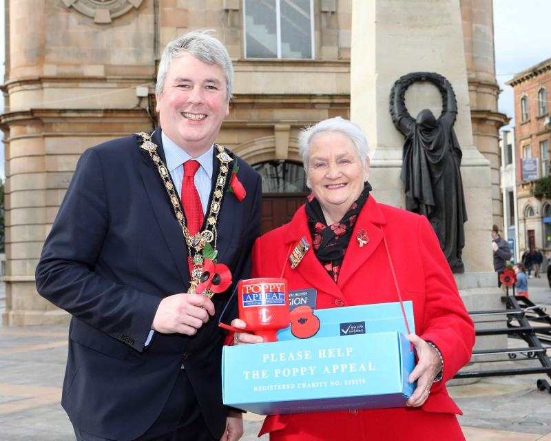 The Mayor of Causeway Coast and Glens Borough Council, Councillor Richard Holmes pictured with Poppy Appeal fundraiser Breeze Galbraith at the launch of the 2021 Poppy Appeal at Coleraine War Memorial