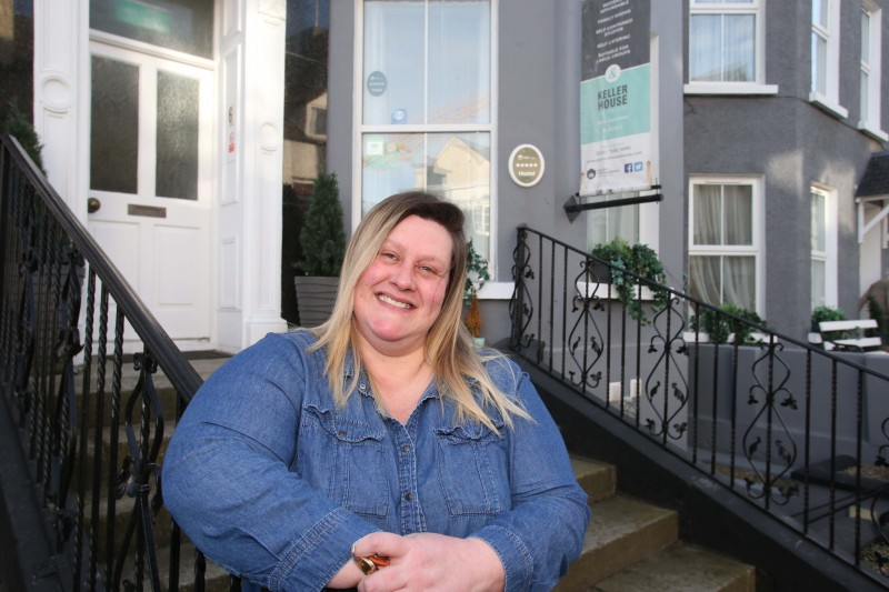 Tamar Brunton, Operations Manager of Portrush Boutique Townhouse Hostel located on Bath Street in Portrush, one of the properties to benefit from the Revitalise scheme funded by the Department for Communities (DfC) and delivered by Causeway Coast and Glens Borough Council.