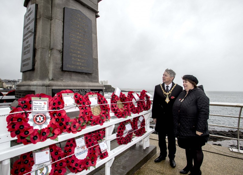 Alderman Mark Fielding Mayor of Causeway Coast and Glens Council with his wife Phyllis at Portstewart War Memorial on Armistice Day