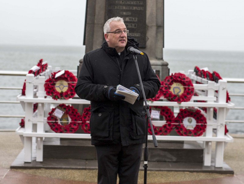 Rev Matthew Ferry at Portstewart War Memorial on Armistice Day.
