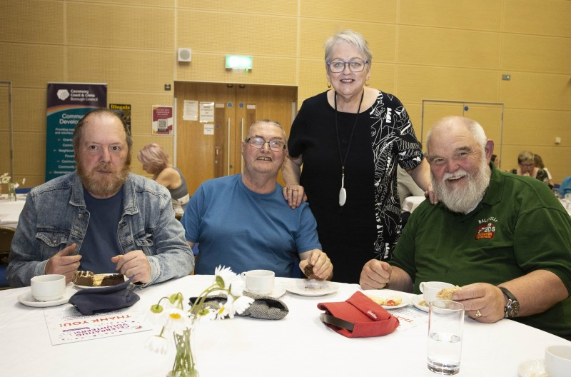 Ballykelly Men’s Shed members Brian, Robert and Andy with Eileen Smith from the Friendly Friday Group at the civic reception in Roe Valley Arts Centre, Limavady.