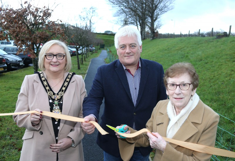The Mayor of Causeway Coast and Glens Borough Council Councillor Brenda Chivers, Gareth Evans, Rural Development Programme Manager for NI, and Philomena Connolly pictured at the official opening of the new walking path.