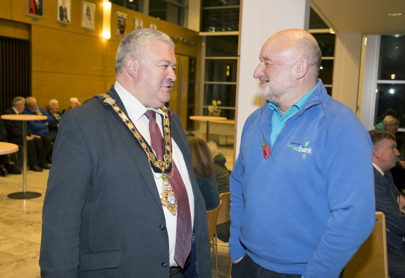 The Mayor of Causeway Coast and Glens Borough Council Councillor Ivor Wallace pictured with Peter Rollins from Ballymoney Food Bank.