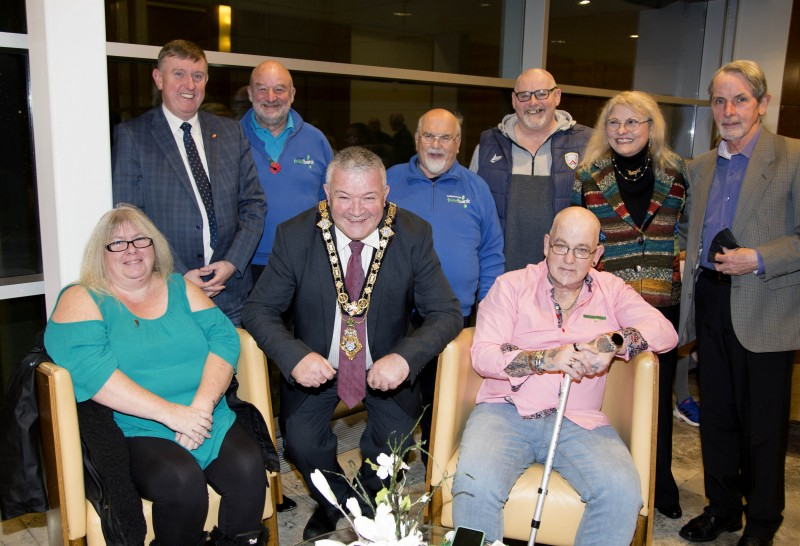 The Mayor of Causeway Coast and Glens Borough Council Councillor Ivor Wallace pictured with some of those from the Vineyard who attended the event in Cloonavin to recognise the work of local Food Banks and Christians Against Poverty.