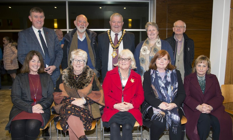 The Mayor of Causeway Coast and Glens Borough Council Councillor Ivor Wallace pictured with some of those from Ballycastle Foodbank who attended the event in Cloonavin to recognise the work of local Food Banks and Christians Against Poverty, along with Councillor Mervyn Storey.
