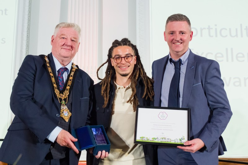 Mayor of Causeway Coast and Glens, Councillor Steven Callaghan and Noel Davoren, Council’s Estates Manager pictured at the 2023 RHS Britain in Bloom Awards with Tayshan Hayden-Smith, RHS Ambassador for young people and community gardening.