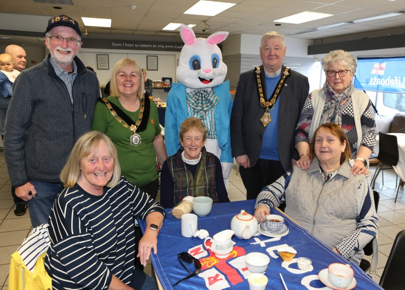 The Mayor Councillor Steven Callaghan and Deputy Mayor Councillor Margaret-Anne McKillop pictured alongside attendees and helpers who made the recent RNLI coffee morning possible.