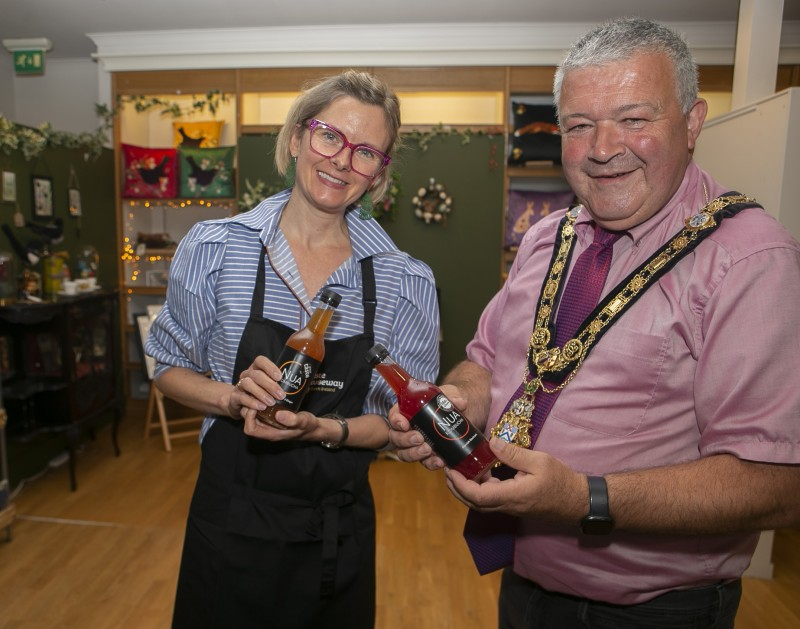 Ann McConnell (Nua Kombucha) pictured with the with Mayor of Causeway Coast and Glens Borough Council Councillor Ivor Wallace at the Stone Row Artisans celebration event.