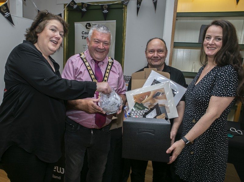 Pictured at the Stone Row Artisans celebration event are (L to R), chef Paula McIntyre, the Mayor of Causeway Coast and Glens Borough Council Councillor Ivor Wallace, Graham Watts (Causeway Coffee/ Chair of Taste Causeway), and Emma Thorpe (Atlantic Rose/ Stone Row Artisans).