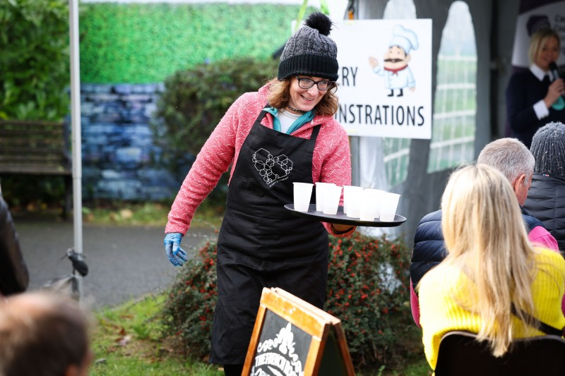 Stella Bolton delights visitors with samples during Bushmills Salmon and Whiskey Festival.