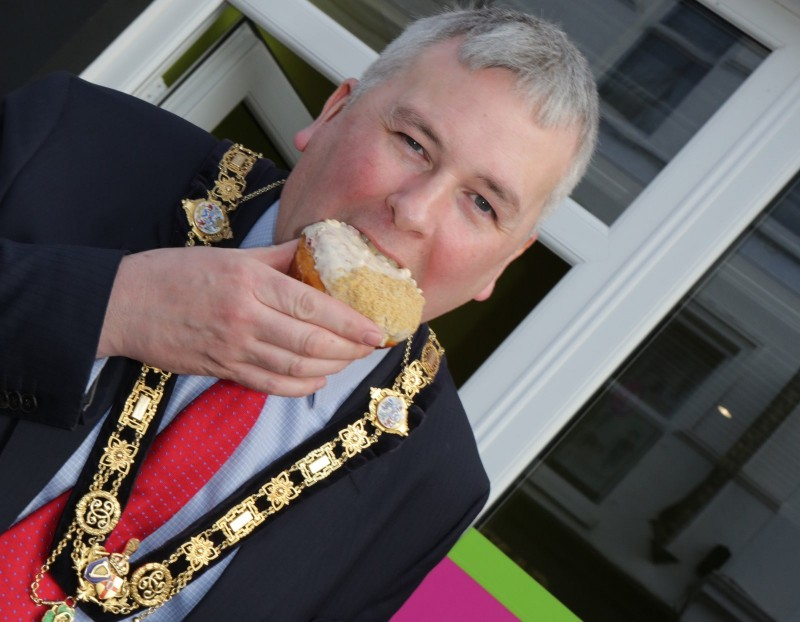 The Mayor of Causeway Coast and Glens Borough Council Councillor Richard Holmes enjoys a Three Queens donut.