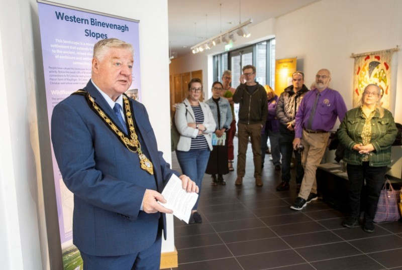 Mayor of Causeway Coast and Glens Borough Council Councillor Steven Callaghan launching the new exhibition ‘Threads and Stitches of our Changing Landscape’ at Roe Valley Arts and Cultural Centre.