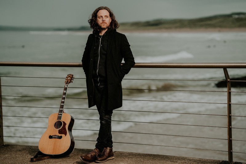 Tour Alaska is the solo project of A Plastic Rose frontman Gerry Norman. This solo expedition is a chance for the Sligo raised artist to show a more mellow side by swapping distorted guitars and screaming vocals for the stripped-back sound of acoustic guitar, piano and viola.