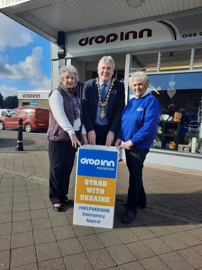 The Mayor of Causeway Coast and Glens Borough Council Councillor Richard Holmes pictured with volunteers from the Drop Inn Ministries shop in Ballymoney.