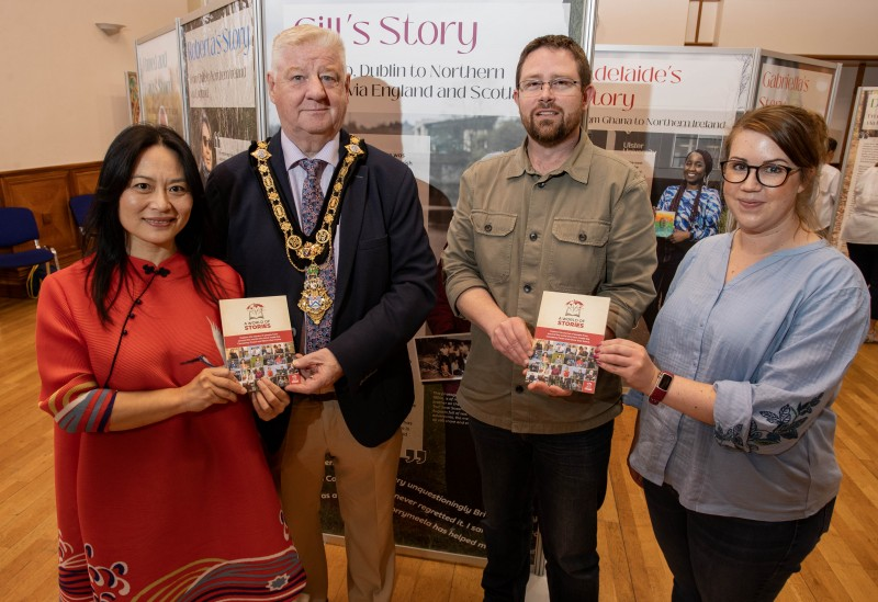 Bonny Cooper, whose story is told in the exhibition, with the Mayor of the Causeway Coast and Glens Borough Council, Councillor Steven Callaghan and Nic Wright and Sarah Calvin from Museum Services at the exhibition in Coleraine Town Hall.