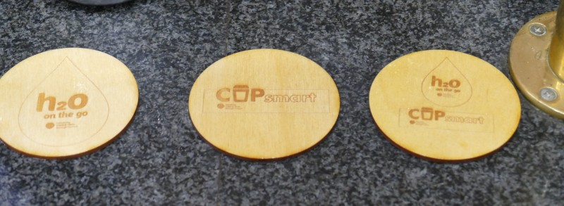 Free recycled wood coasters made by Limavady Men’s Shed are being handed out to reinforce the environmentally friendly message and promote the CupSmart and H20 On The Go schemes.