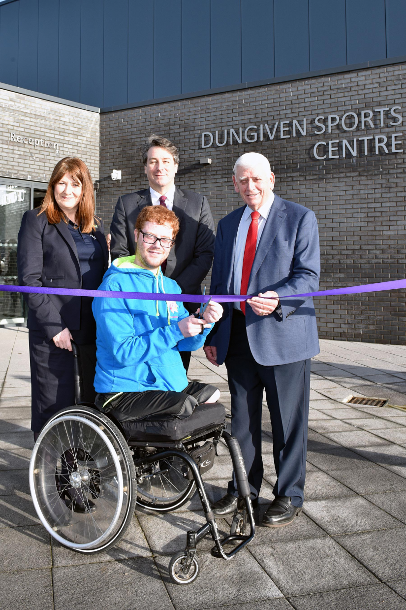Cutting the ribbon to officially open Dungiven Sports Centre are Rian O'Connor alongside Antoinette McKeown from Sport NI, Ian Snowden from Department for Communities and Alderman William King MBE, Causeway Coast and Glens Borough Council