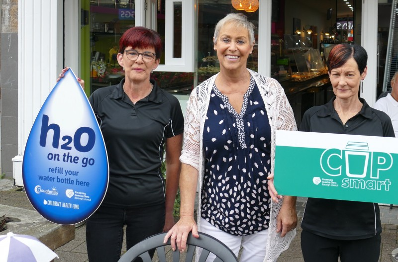 Paula O'Kane, owner of Herald's at 22 in Coleraine marks her participation in Causeway Coast and Glens Borough Council’s CupSmart and H20 On The Go schemes with staff members Theresa and Louise.