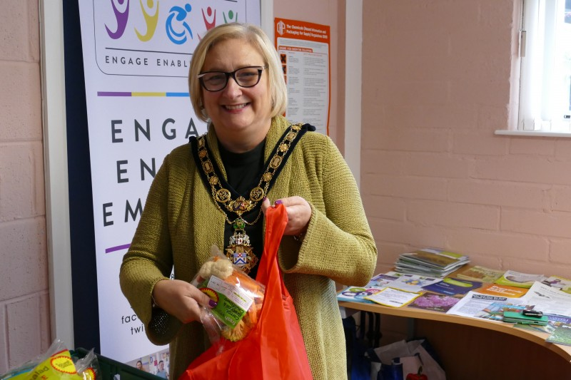The Mayor of Causeway Coast and Glens Borough Council Councillor Brenda Chivers joins in with the food sharing initiative which has seen a new Community Fridge established in Dungiven.