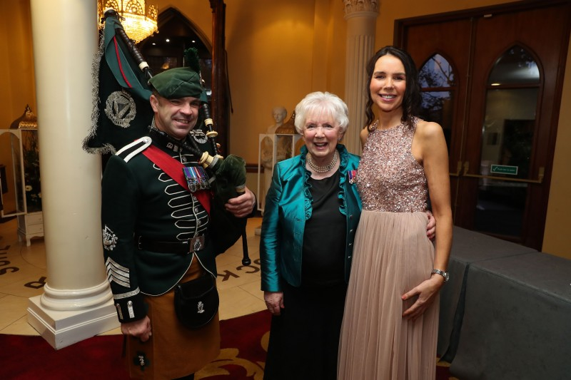 Mrs Joan Christie CVO OBE pictured at the gala dinner with Councillor Stephanie Quigley and the Pipe Major.