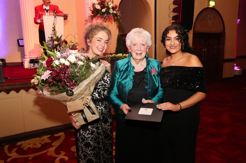 Joan Christie CVO OBE pictured with her cadets Rebekah and Yasmin.