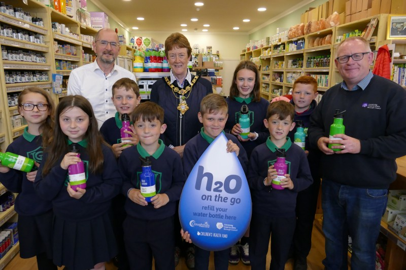 The Mayor of Causeway Coast and Glens Borough Council, Councillor Joan Baird, OBE pictured with Ivor Bolton, The Real Health Store, Coleraine, Declan Donnelly, Causeway Coast and Glens Borough Council’s Environmental Resource Officer and children from St Malachys Primary School in Coleraine.