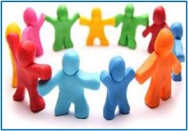 a group of dough people of different colours holding hands in a circle