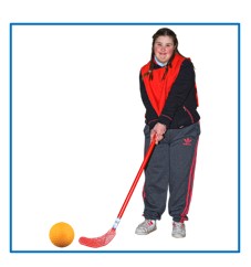 A young girl playing Hockey