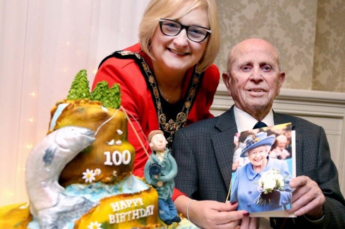 Norman Irwin celebrates his 100th birthday with a surprise party in Coleraine